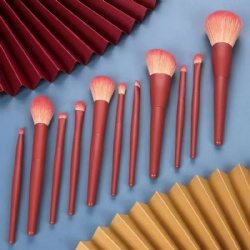 Red makeup brush